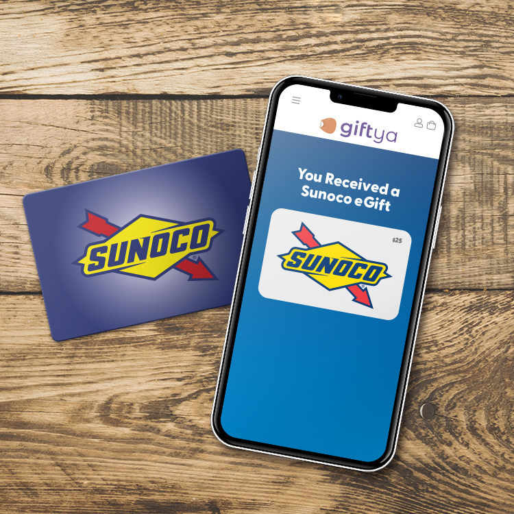 Sunoco gift card and a Sunoco e-gift card displaying on phone over a table
