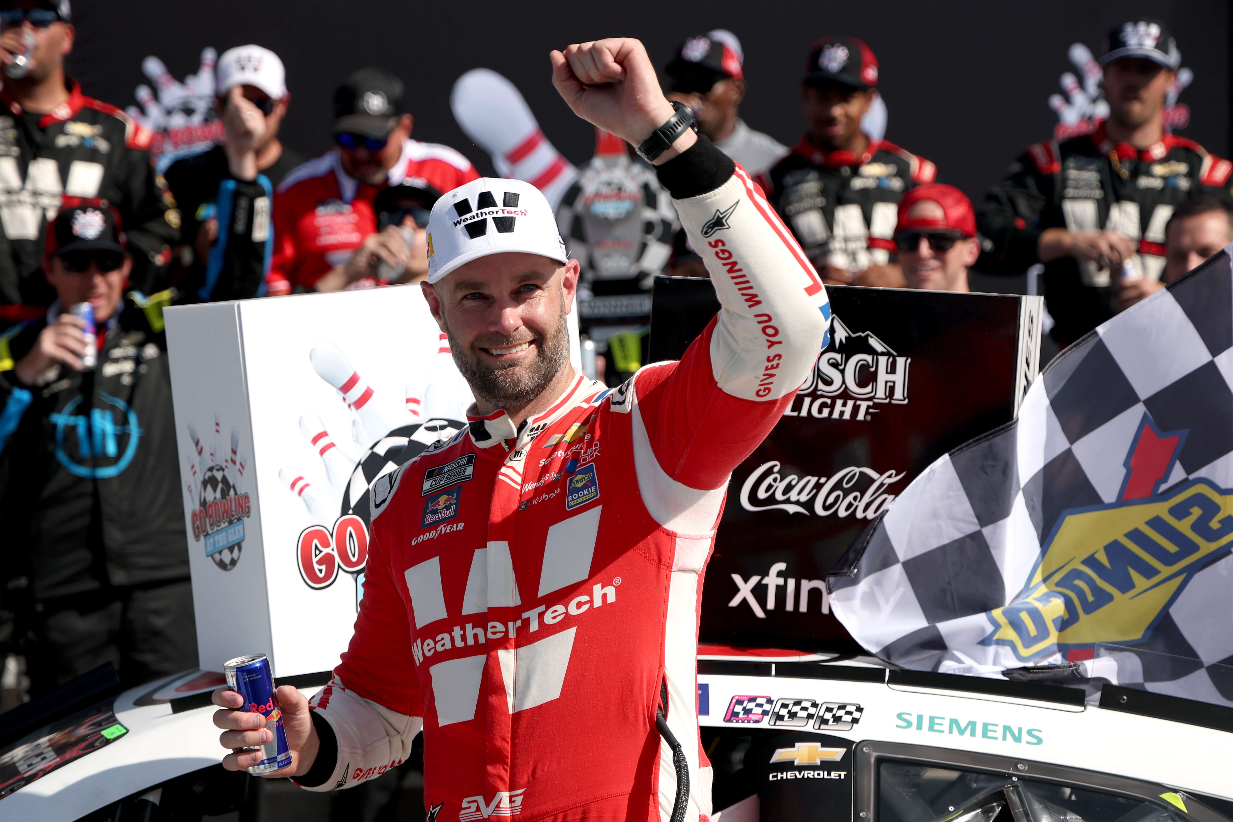 Shane van Gisbergen rasing arm up