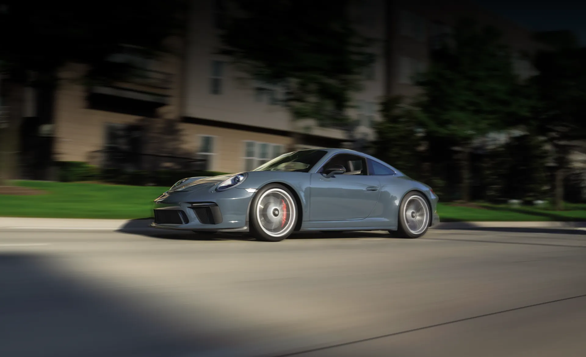 Image of sports car driving on road