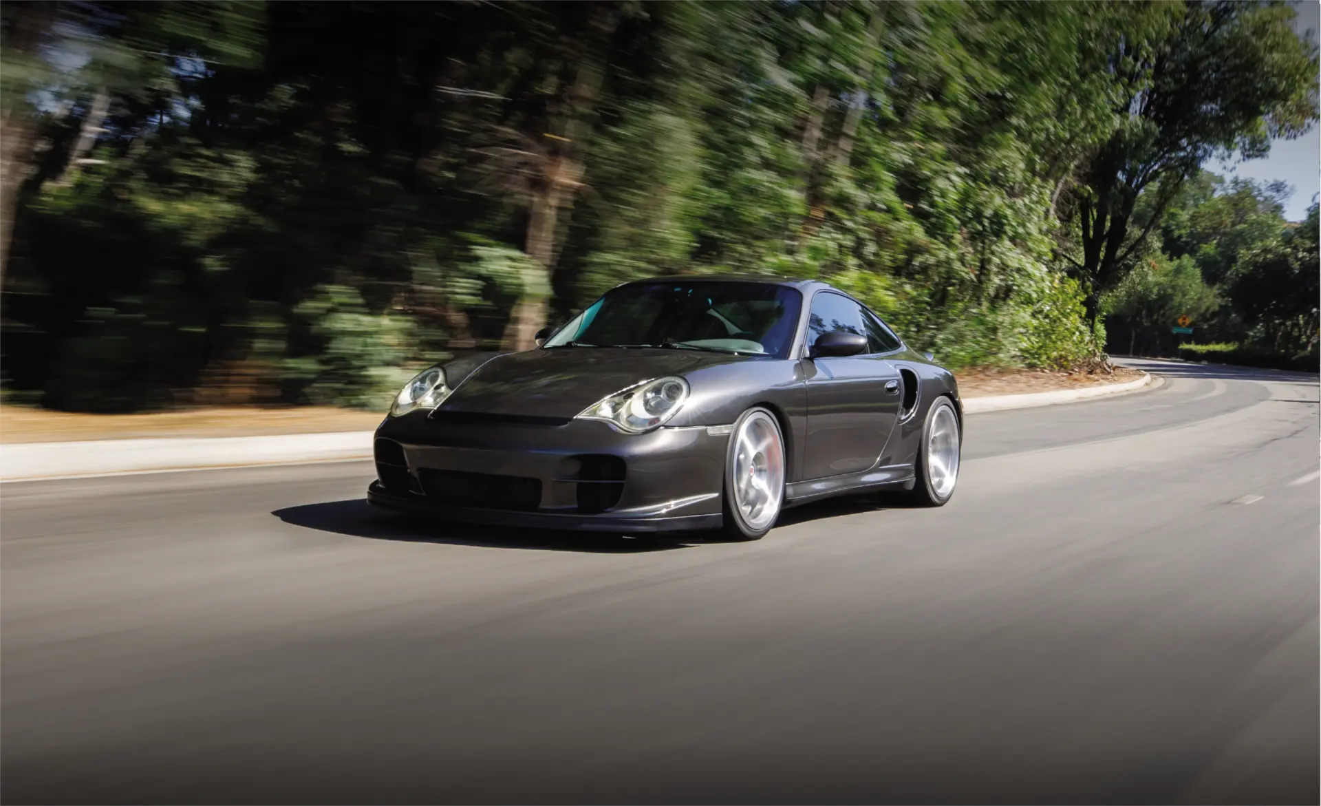 Image of sports car driving on road