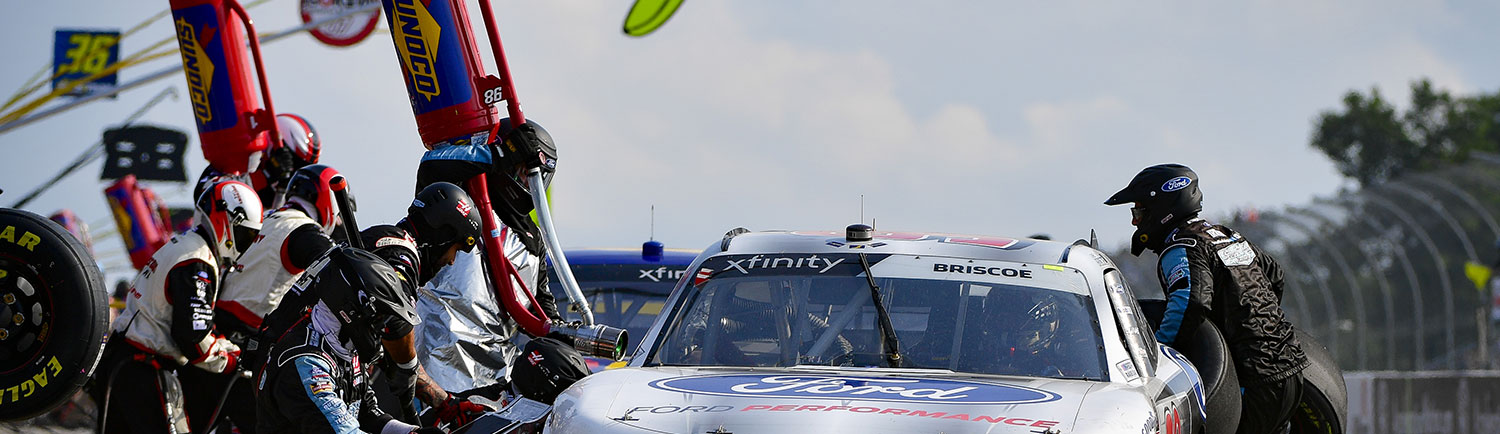 Car being refueled with Sunoco fuel in race