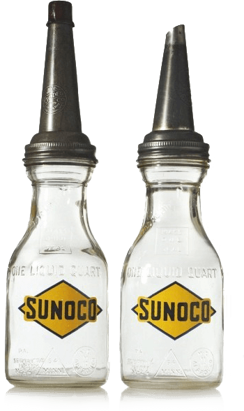 Two empty glass quarts that typically hold fuel, stamped with the Sunoco logo