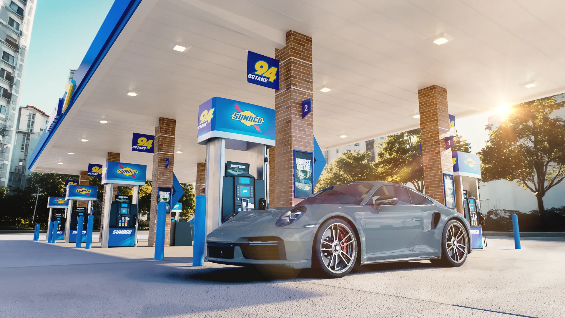 Sunoco branded fuel pumps at Sunoco station with sports car at pump