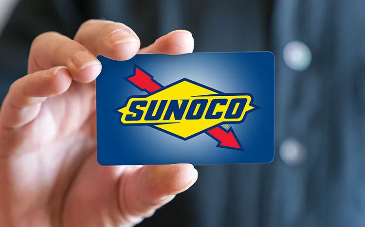 Man holding Sunoco card