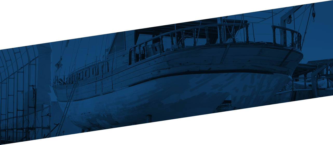 Large ship pulling into a dock